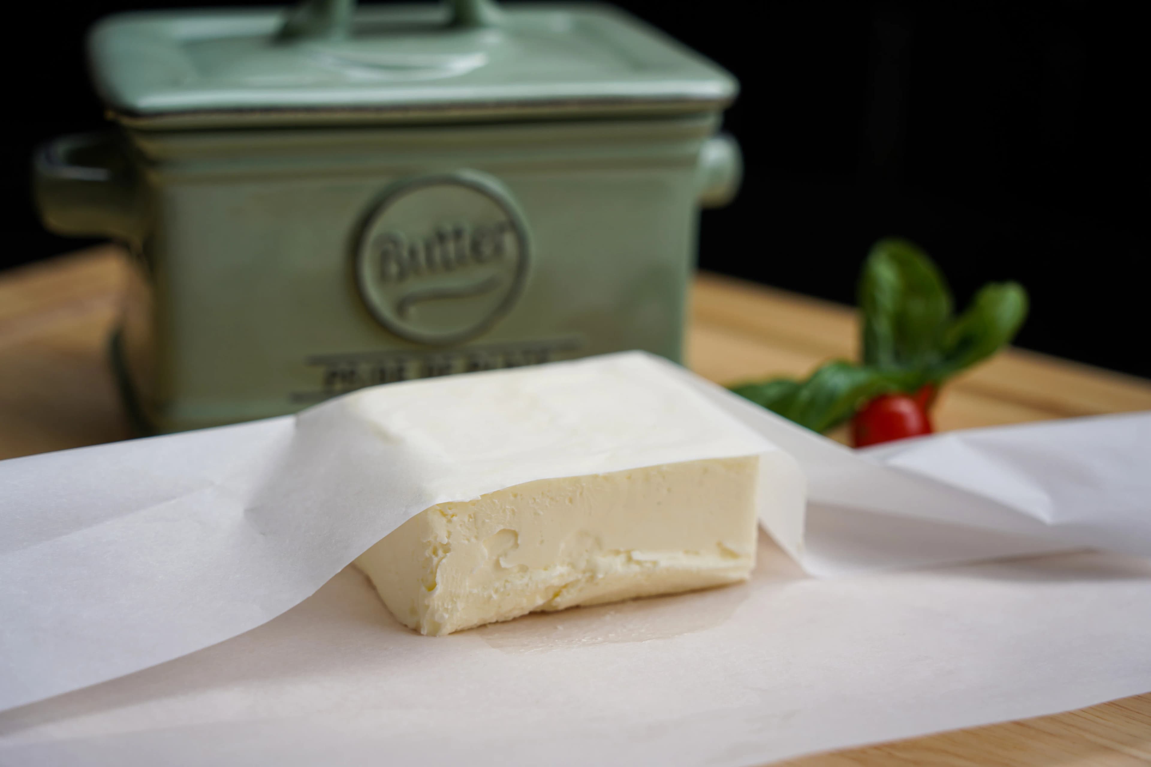 Vegetable parchment paper — food-safe wrap around a block of butter