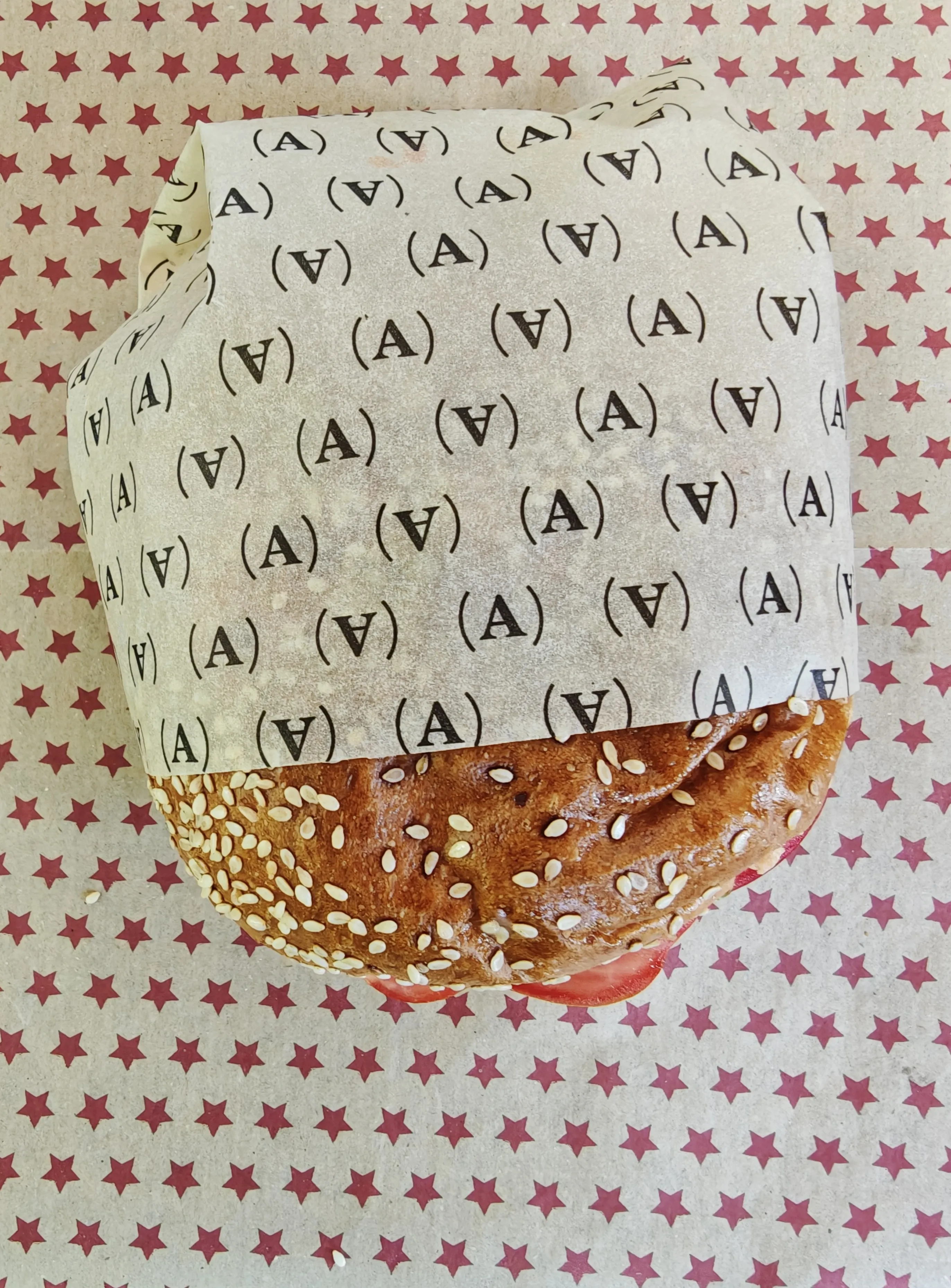 Greaseproof paper — oil-resistant baking sheet on a tray